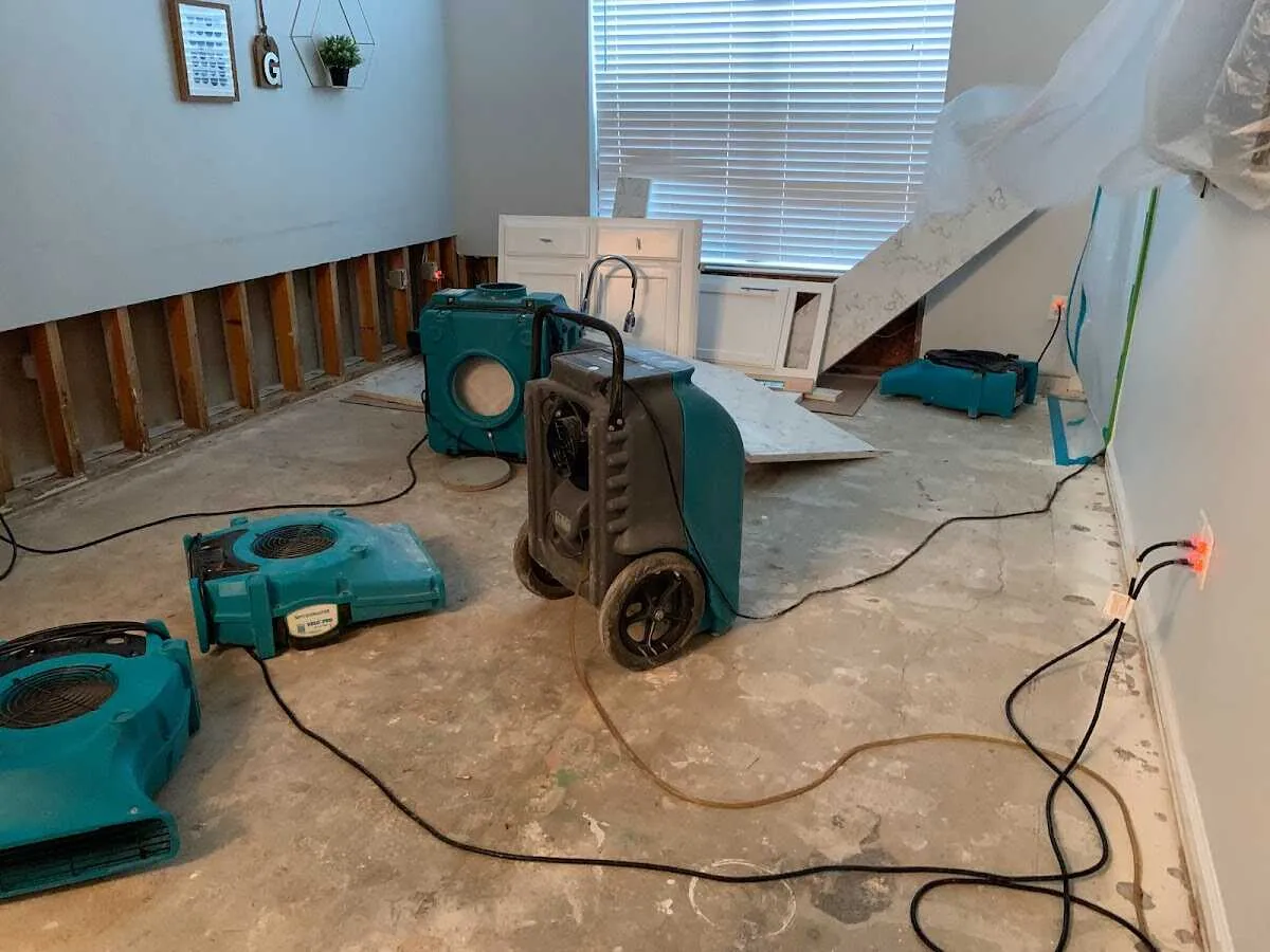 Dehumidifier in flood-cut room for Water Damage Restoration in Largo
